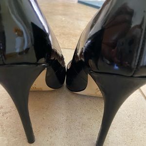 Black patent leather pumps